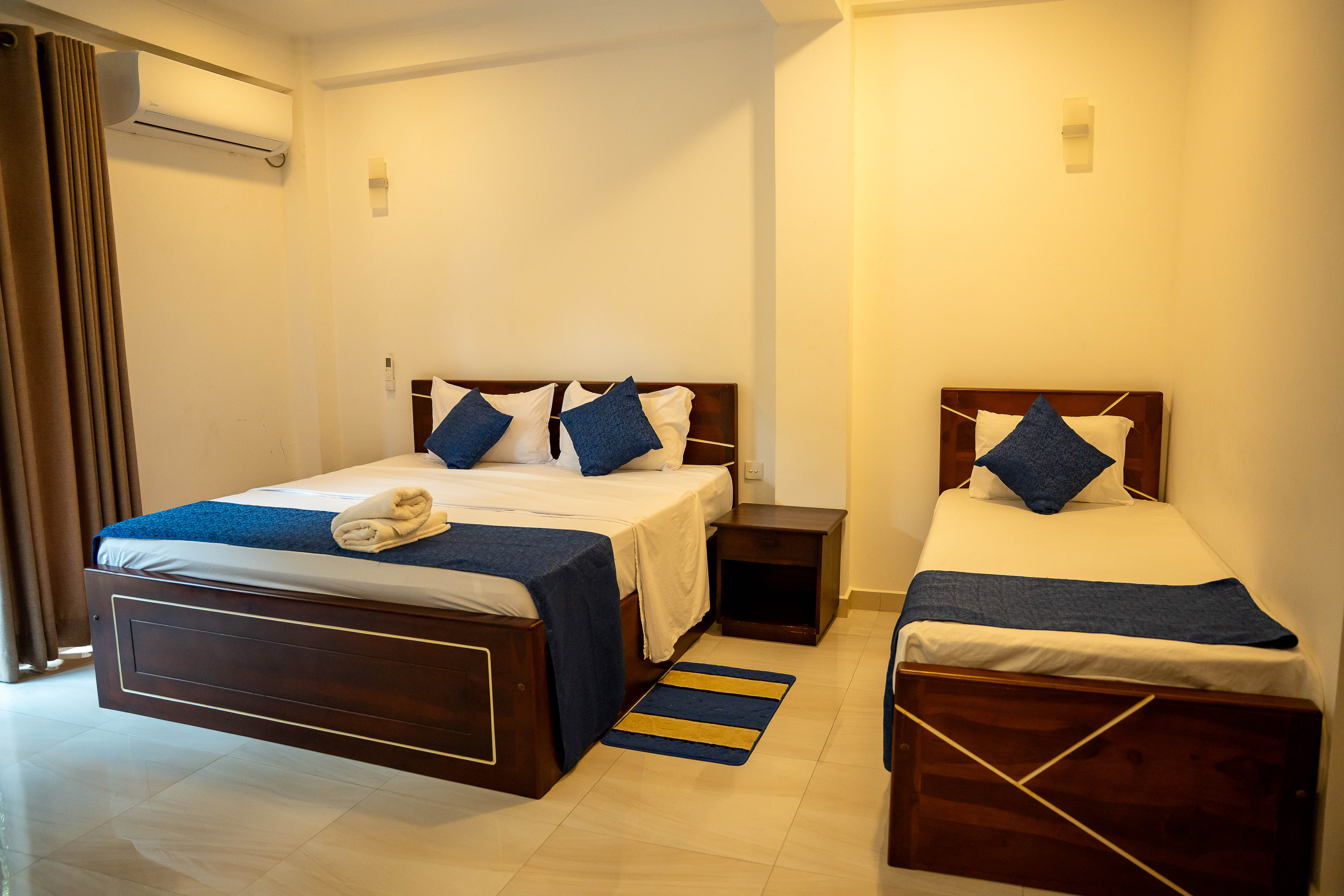 Deluxe Family Triple Suite